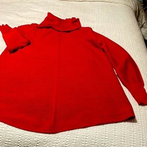 Oversized red knit turtle neck sweater